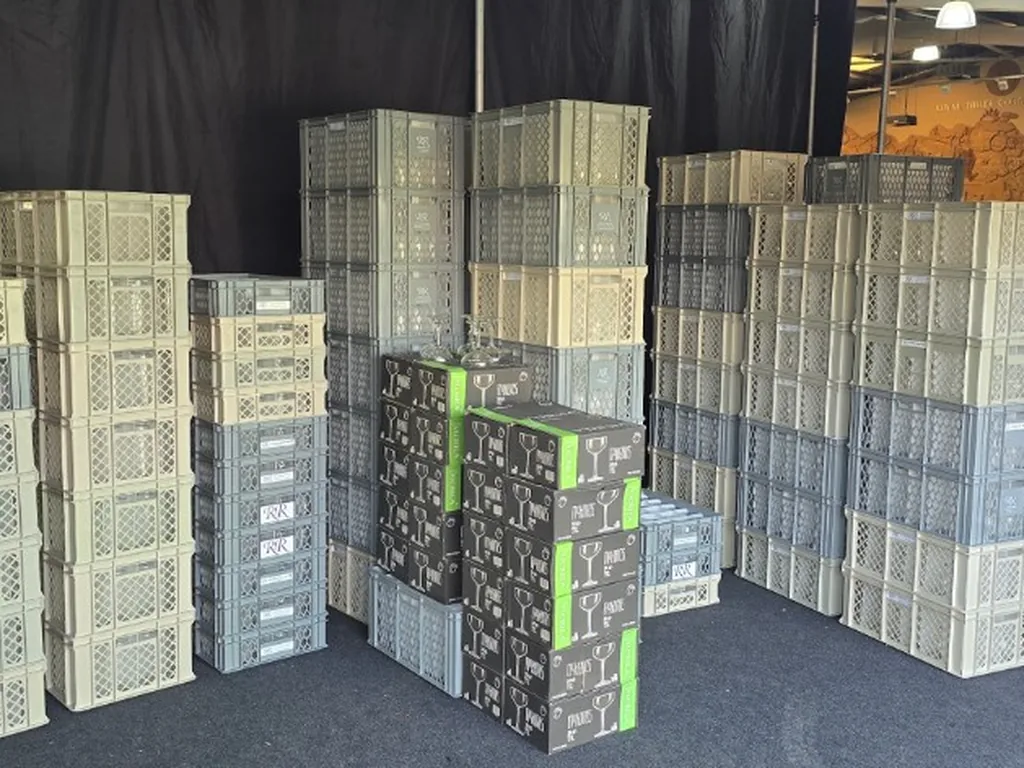 Stacked glass crates delivered to Three Counties Showground