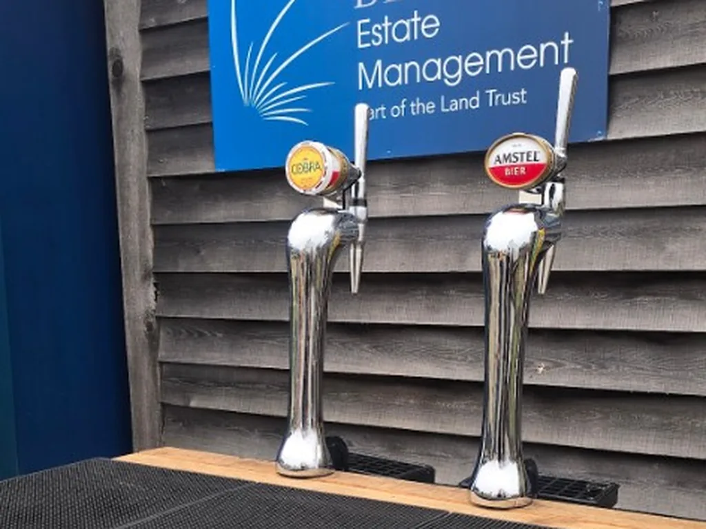 Outdoor slat-front bar with Amstel and Cobra taps in Boreham, Essex