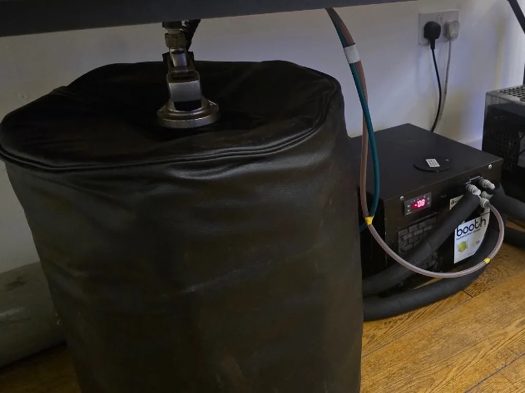 Insulated keg and flash cooler under the bar at a Peak District Airbnb