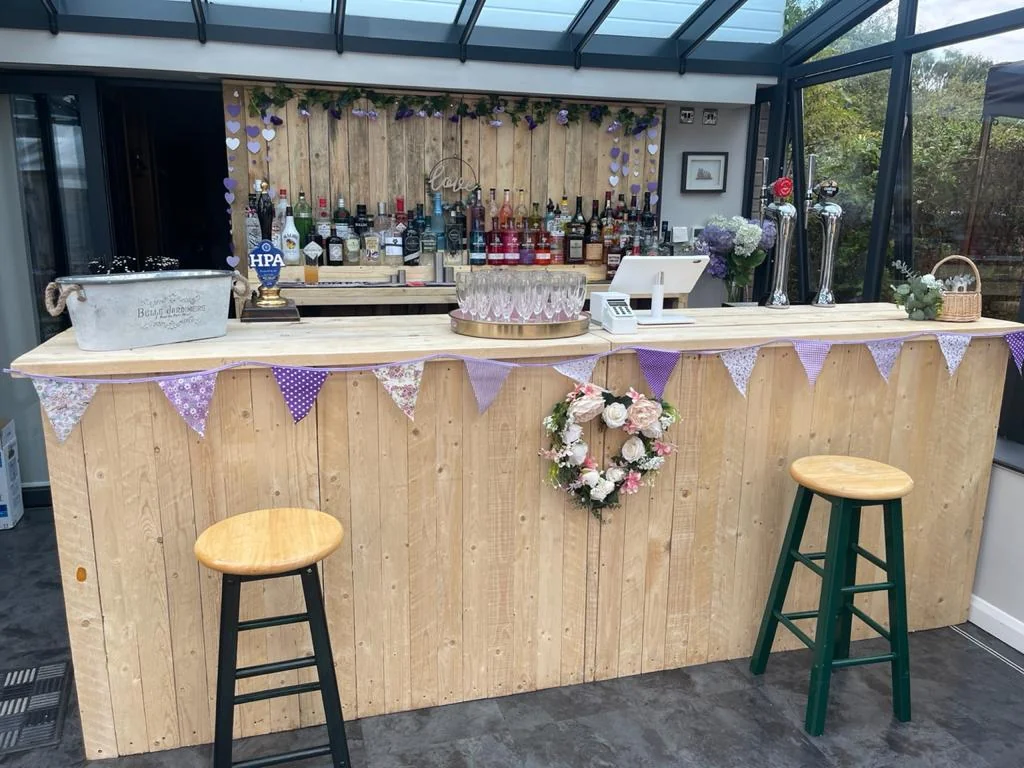 Rustic wooden wedding bar unit near Hereford