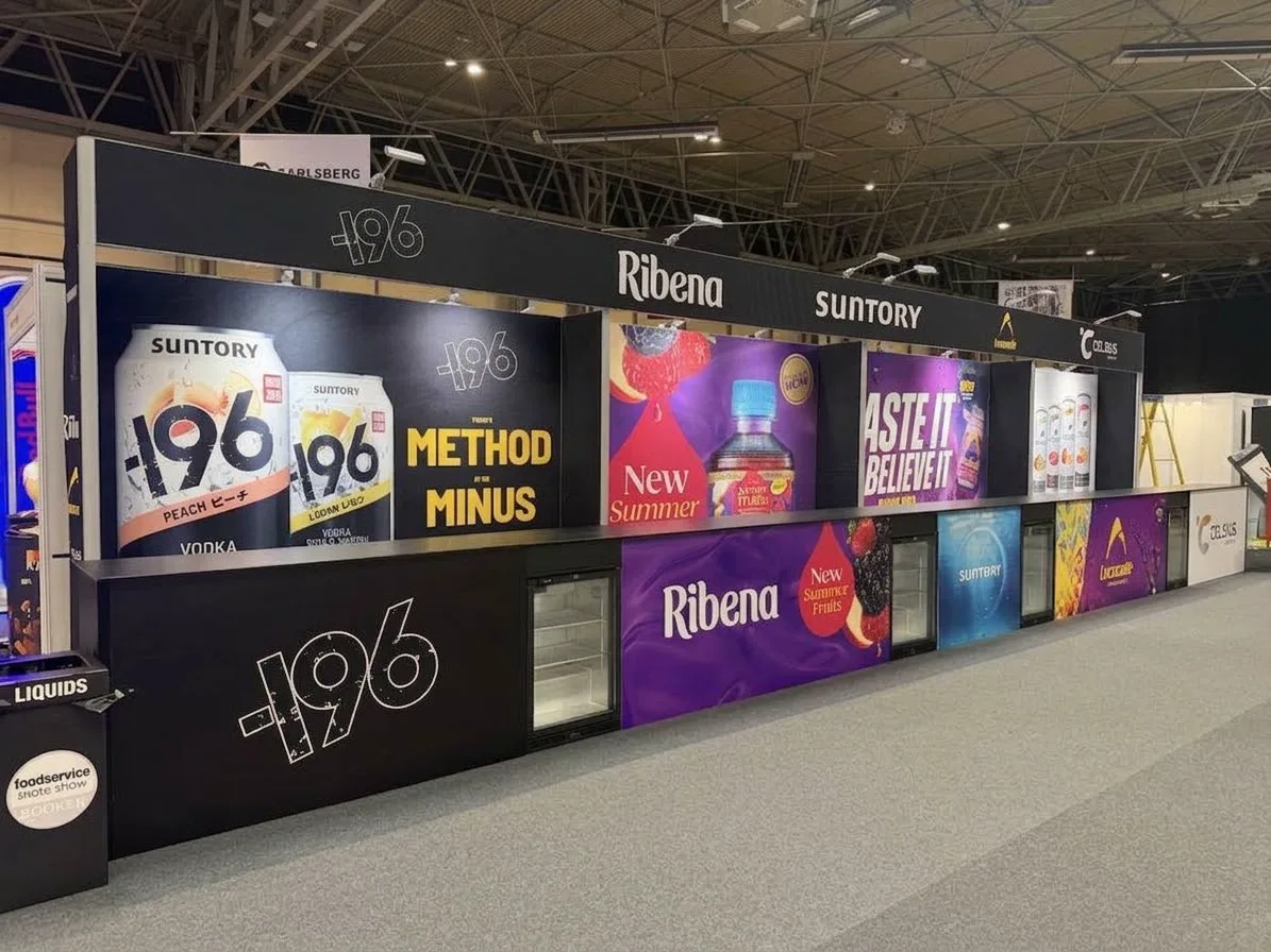 Long modular multi-brand exhibition bar at the NEC Birmingham